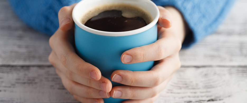 Hands And Mug