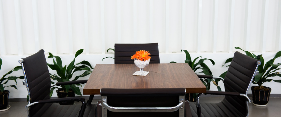 four chairs around a table