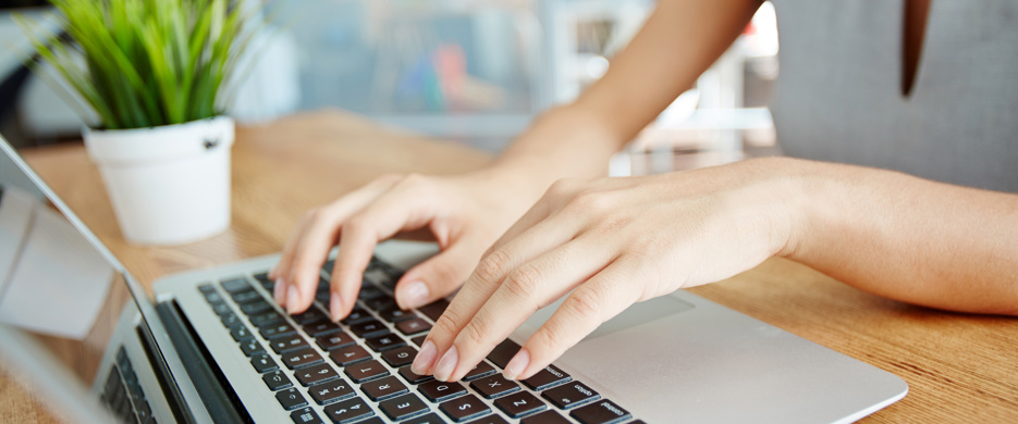 typing on laptop