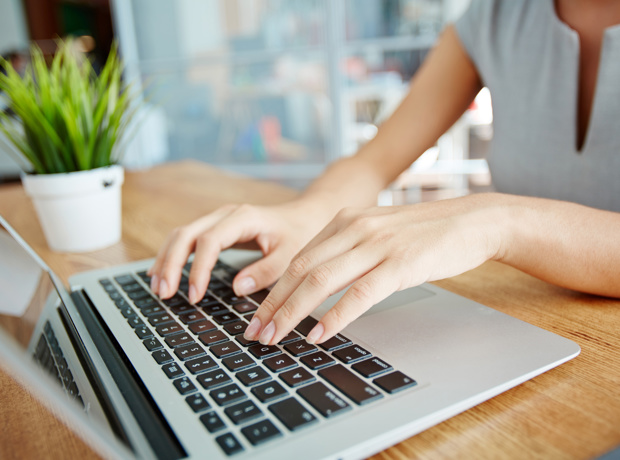 typing on laptop