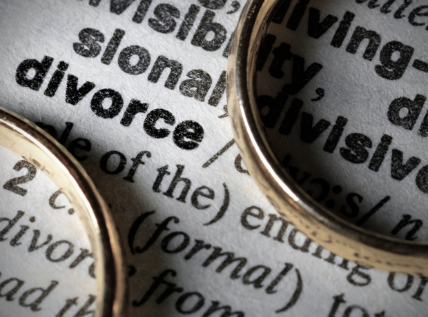 Divorce Definition with rings sitting on top