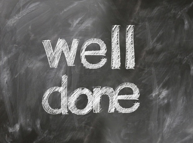 Well Done chalked on blackboard