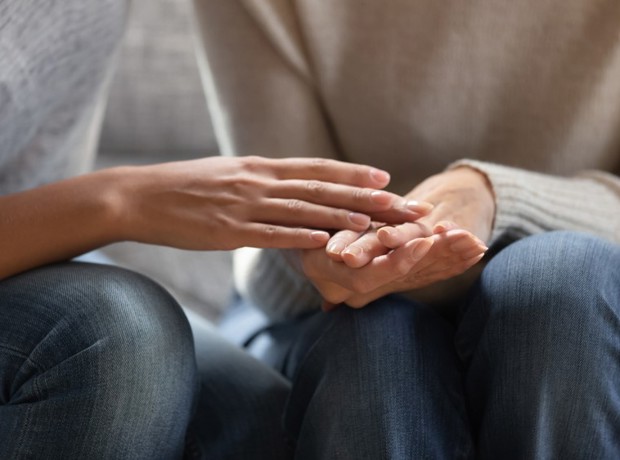 Someone holding another person's hand