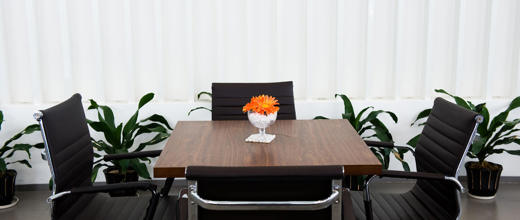 four chairs around a table