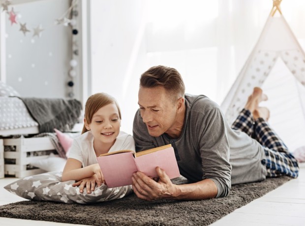 Father and daughter reading