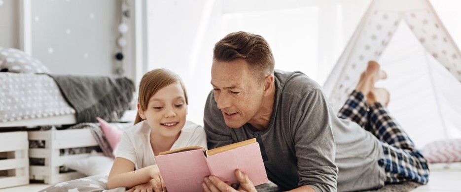 Father and daughter reading