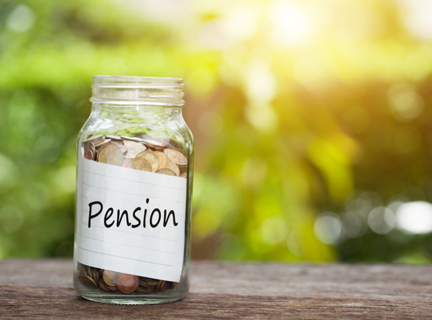 coins in a jar with pension label