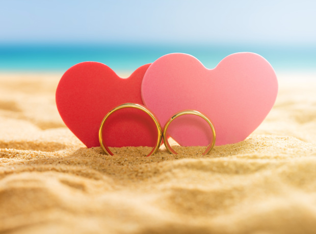 two hearts stood in sand