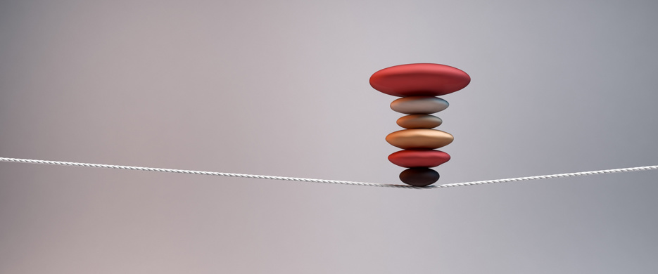 pile of stones balanced on string